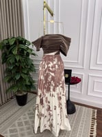 فستان سهرة طويل 2025 بتصميم فاخر وألوان ناعمة