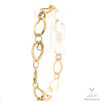 سوارة ذهب عيار 18 تصميم حلقات متناغمة فاخرة (SW.55...