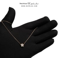 قلادة النجمة مزينة بفص اسود ذهب عيار 18 (NC.5709BK...