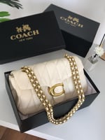 شنطة درجة أولى مستوحاه من كوتش