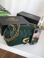 شنطة درجة أولى مستوحاه من كوتش