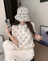 أبيض بنقشة GG بني