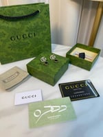 أقراط ماستر بشعار قوتشي كريستالية