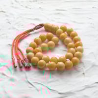 مسباح تراب كهرمان