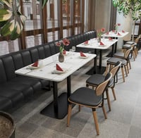 كرسي جلد لون خشبي غامق وأسود