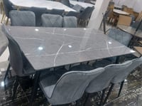 طقم طاولة طعام و ثمانية كراسي