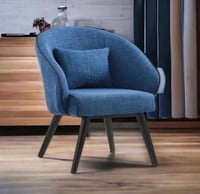 كرسي قماش لون ازرق بحواف سوداء