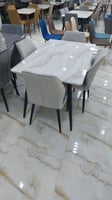 طاولة طعام واربع كراسي لون ابيض