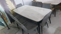 طاولة طعام و6 كراسي رمادي