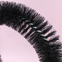 خداشة مدلكة للقطط على شكل قوس مع الكاتنيب