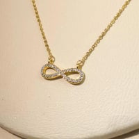 سلسال انفنتي ذهبي زركون