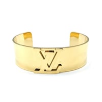 اسوارة ال في قيد مفتوحة من الاسفل مطلية ذهب بتصميم...