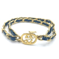 سلسال / اسوارة بشريط جلد بتصميم مستوحى من قوتشي