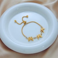 اسوارة فراشات مطلية بالذهب عيار 18