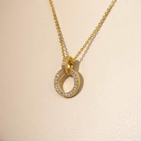 سلسال باندورا دائري ذهبي زركون