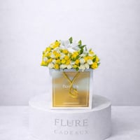 شوكولاتة بستاني مع ورد بيبي جوري أبيض وأصفر