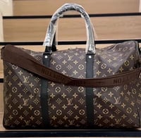 شنطة سفر من لويس فيتون