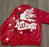 Hellstar's red bomber jacket is decorated with a b...