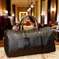 شنطة سفر لويس فيتون