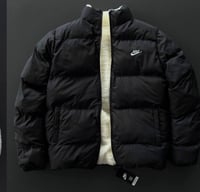 جاكيت دبل فيس من نايك أبيض