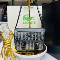 شنطة كتف لاكوست