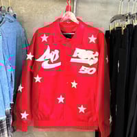 Hellstar's red bomber jacket is decorated with a b...