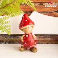 ديكور ولد مع قبعة على شكل فطر