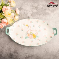 صحن بيضاوي بمقبضين رسم وزه