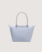 شنطة نسائية بمقاس كبير بلون أزرق