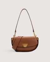 شنطة نسائية بمقاس متوسط باللون البني