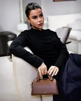 شنطة نسائية عملية باللون البني