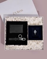 هدية نسائية من ساعة ومحفظة وميدالية