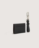 محفظة نسائية و ميدالية جلد بلون أسود