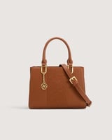 شنطة بلون بني بحجم متوسط لكل يوم