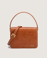 شنطة نسائية أنيقة بلون بني