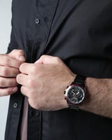 ساعة رجالية ستيل لون أسود بإطار أحمر