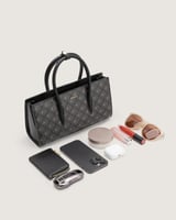 شنطة ورد النسائية جلد بلون أسود