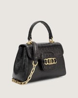 شنطة نسائية من الجلد البارز بلون أسود