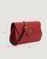 شنطة نسائية بتصميم أنيق بلون أحمر