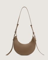 شنطة بمقاس واسع باللون البني