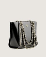 شنطة نسائية من الجلد بلون أسود