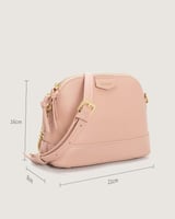 شنطة نسائية بتصميم أنيق بلون وردي