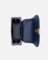 شنطة نسائية بتصميم مميز بلون أزرق