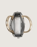 ‎ شنطة نسائية جذابة بلون فضي وذهبي