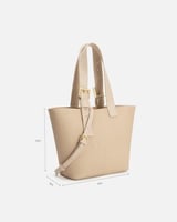 شنطة بتصميم واسع تكفي لأغراضك بلون بيج