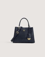 شنطة نسائية متوسطة الحجم بلون كحلي