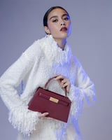 شنطة دفء النسائية جلد بلون عودي