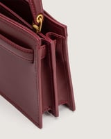 شنطة دفء النسائية جلد بلون عودي