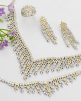 طقم نسائي زركون أنيق بلون فضي وذهبي