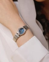 ساعة عنقاء النسائية ستيل بلون ذهبي وفضي